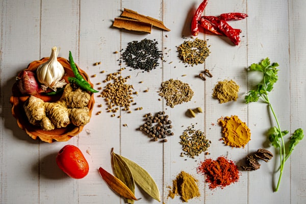 Whole spices, herbs and vegetables laid out